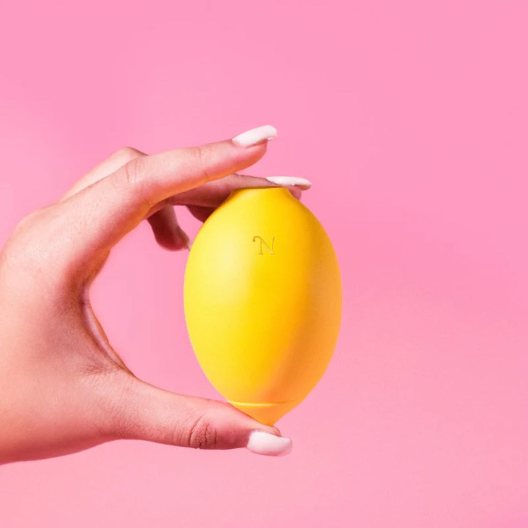 Lemon vibrator in hand showing size